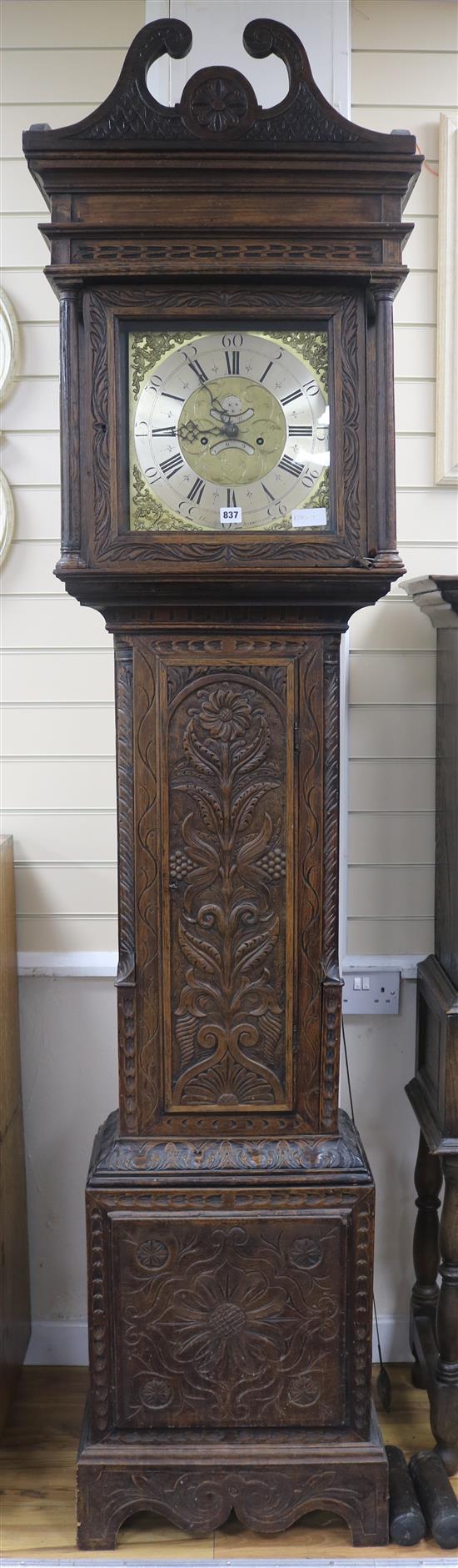 A George III carved oak eight day longcase clock by J. Stancliffe of Barkisland , H.234cm